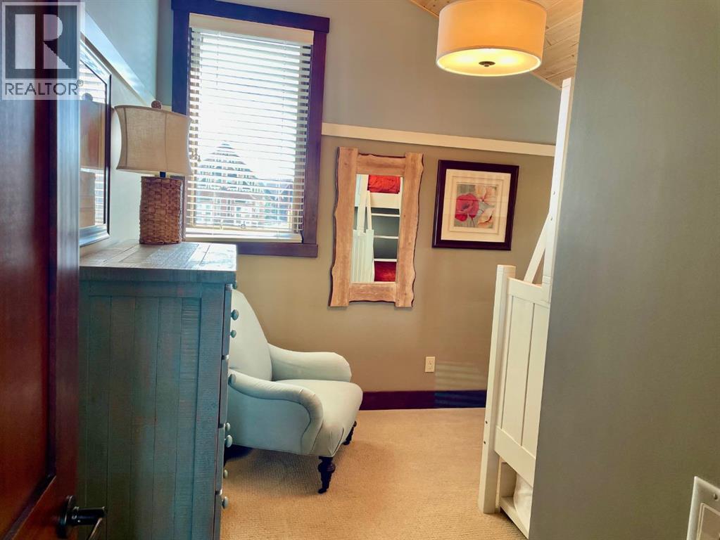 249 Cottageclub Crescent, Rural Rocky View County, Alberta  T4C 1B1 - Photo 26 - A2247550