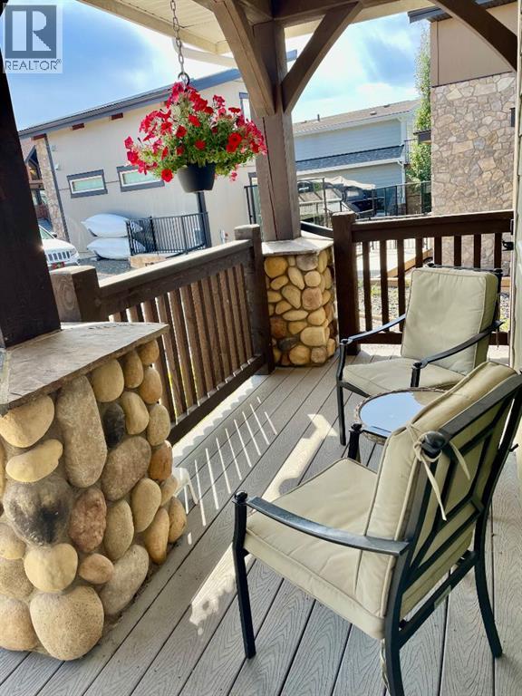 249 Cottageclub Crescent, Rural Rocky View County, Alberta  T4C 1B1 - Photo 3 - A2247550