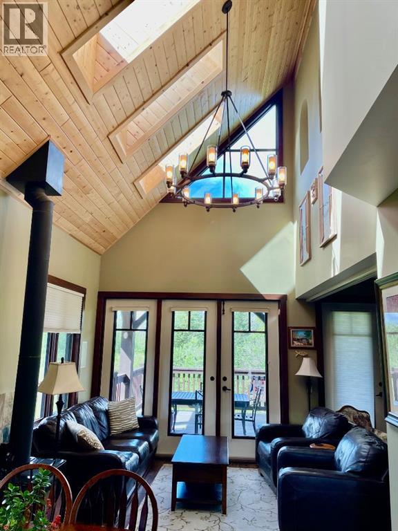 249 Cottageclub Crescent, Rural Rocky View County, Alberta  T4C 1B1 - Photo 7 - A2247550