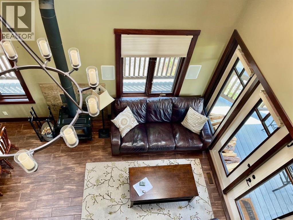 249 Cottageclub Crescent, Rural Rocky View County, Alberta  T4C 1B1 - Photo 22 - A2247550