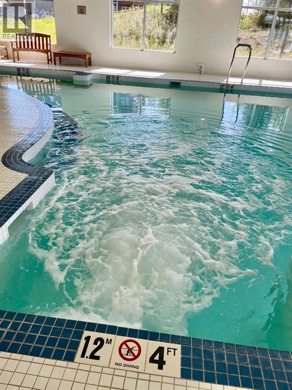 249 Cottageclub Crescent, Rural Rocky View County, Alberta  T4C 1B1 - Photo 39 - A2247550