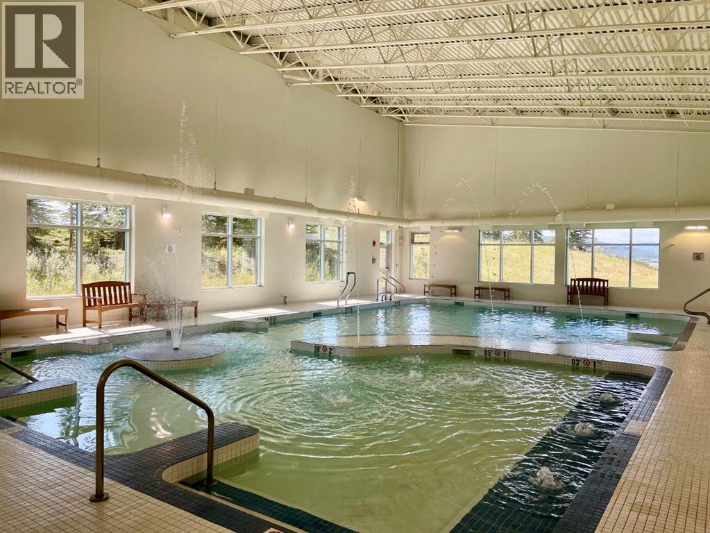 249 Cottageclub Crescent, Rural Rocky View County, Alberta  T4C 1B1 - Photo 38 - A2247550