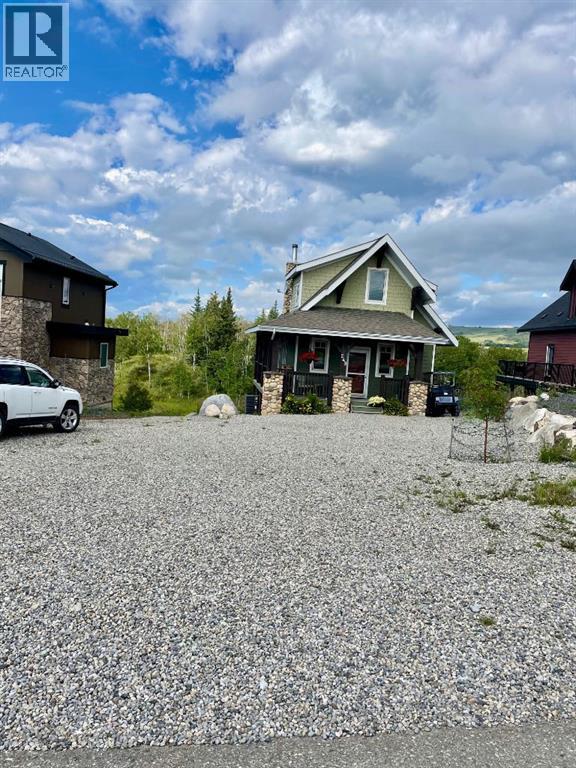 249 Cottageclub Crescent, Rural Rocky View County, Alberta  T4C 1B1 - Photo 30 - A2247550