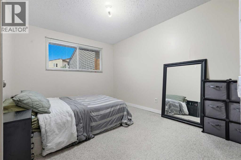 1137 Berkley Drive Nw, Calgary, Alberta  T3K 1S6 - Photo 16 - A2270368