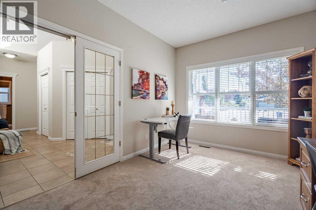 100 Coopers Heights Sw, Airdrie, Alberta  T4B 2S1 - Photo 4 - A2259009