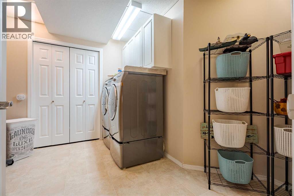 100 Coopers Heights Sw, Airdrie, Alberta  T4B 2S1 - Photo 30 - A2259009