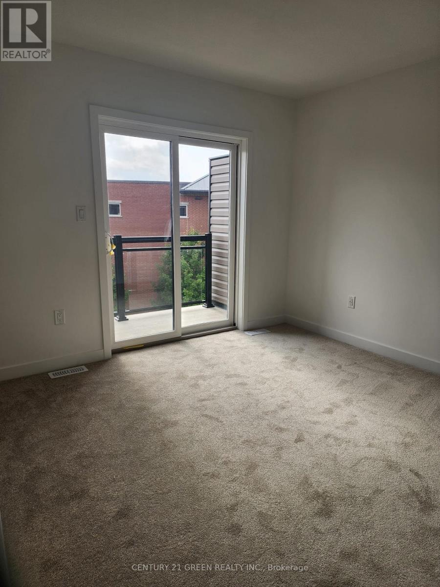 104 - 940 St David Street N, Centre Wellington, Ontario  N1M 0L4 - Photo 3 - X12549446