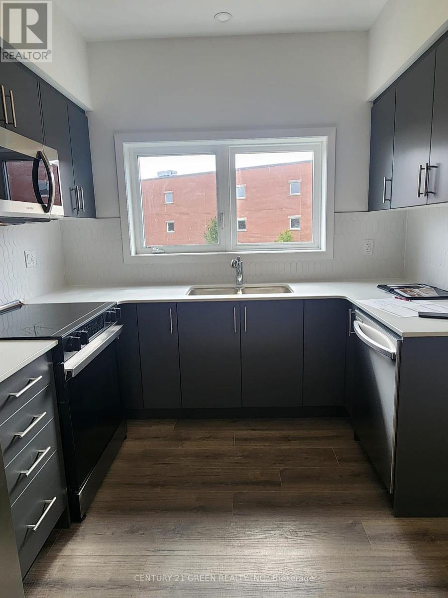 104 - 940 St David Street N, Centre Wellington, Ontario  N1M 0L4 - Photo 4 - X12549446