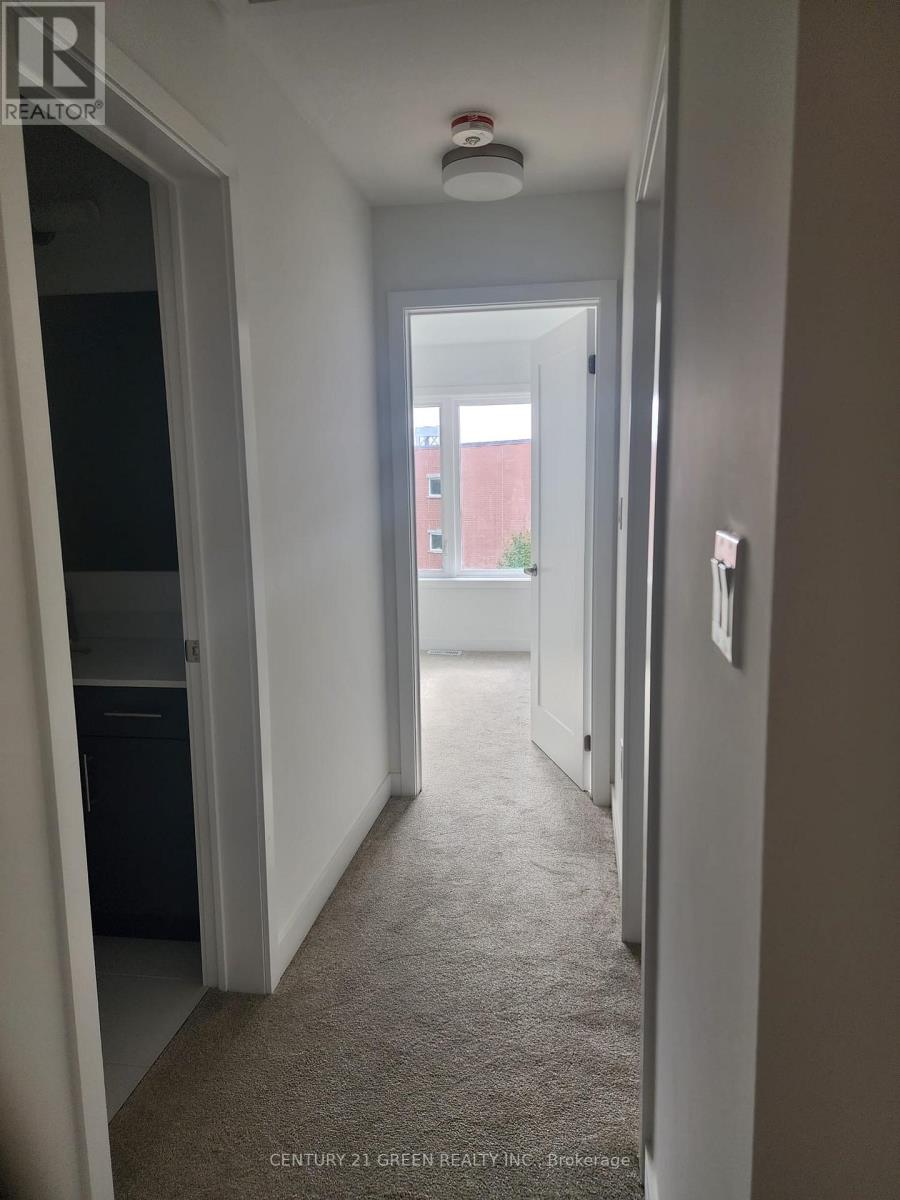 104 - 940 St David Street N, Centre Wellington, Ontario  N1M 0L4 - Photo 5 - X12549446