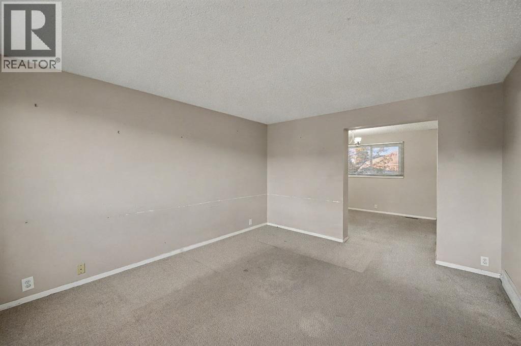 24 Hunters Gate, Okotoks, Alberta  T1S 1K9 - Photo 4 - A2269028