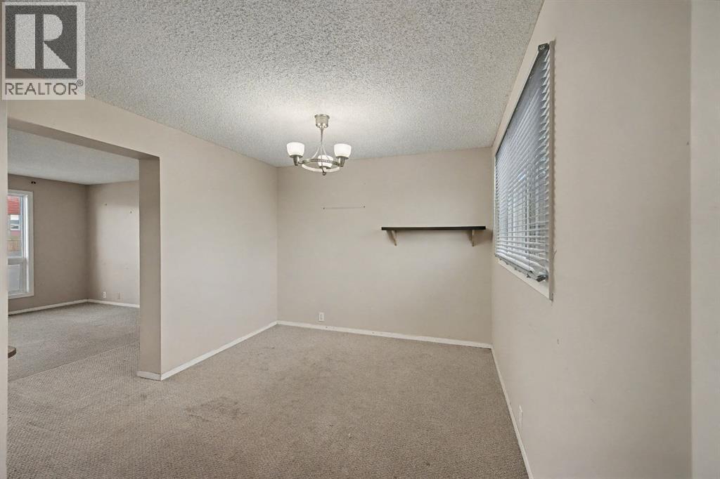 24 Hunters Gate, Okotoks, Alberta  T1S 1K9 - Photo 7 - A2269028