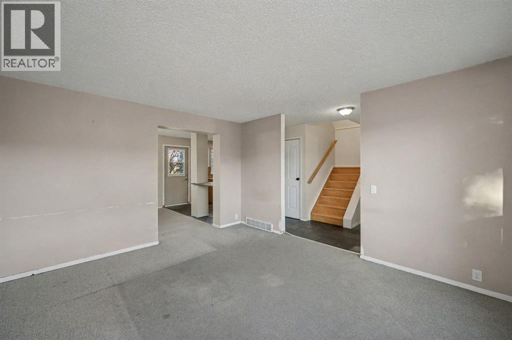 24 Hunters Gate, Okotoks, Alberta  T1S 1K9 - Photo 5 - A2269028