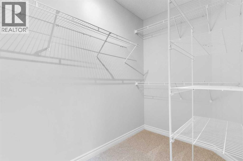 928 Prairie Springs Drive Sw, Airdrie, Alberta  T4B 0E4 - Photo 25 - A2246915