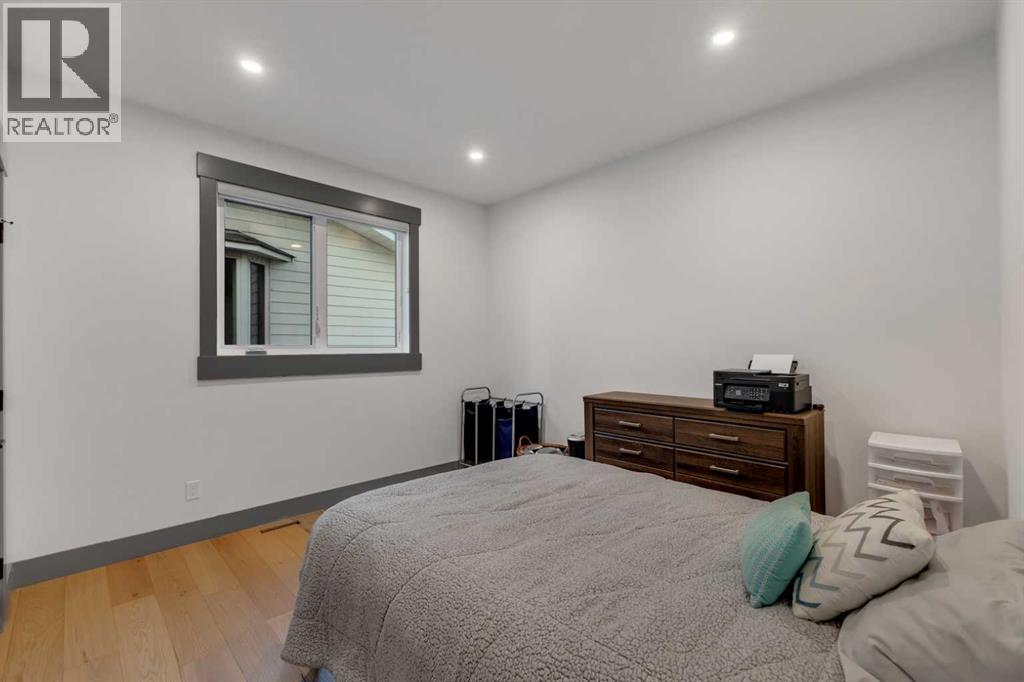 30 Roselawn Crescent Nw, Calgary, Alberta T2K 1K6 - Photo 33 - A2269817