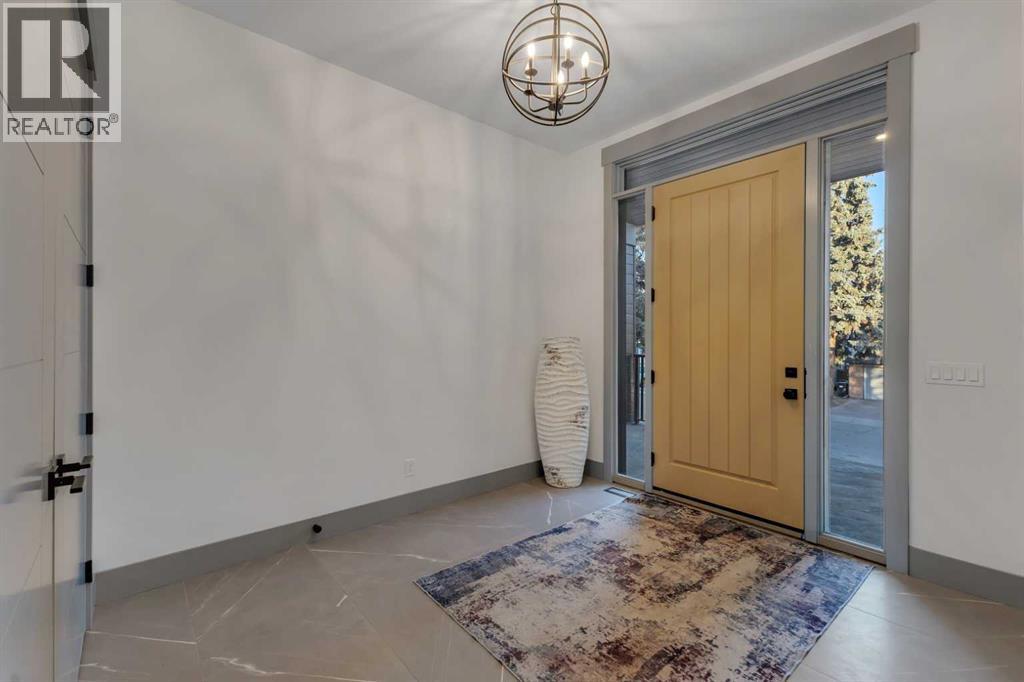 30 Roselawn Crescent Nw, Calgary, Alberta T2K 1K6 - Photo 5 - A2269817