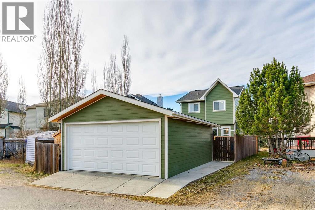 179 Crystal Shores Grove W, Okotoks, Alberta  T1S 1Y2 - Photo 38 - A2269991