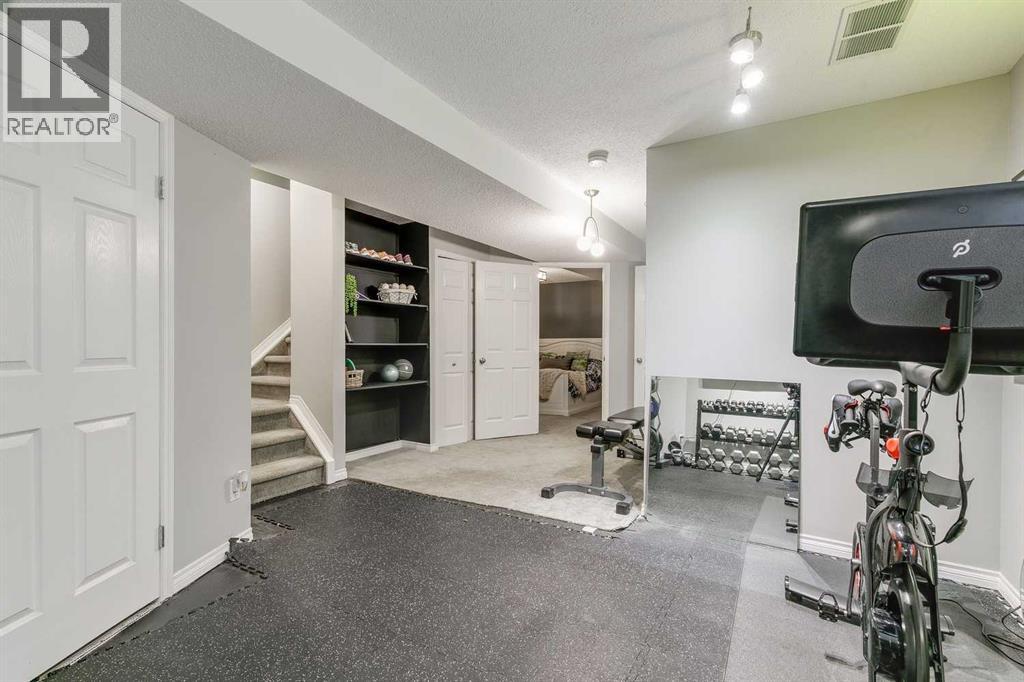 179 Crystal Shores Grove W, Okotoks, Alberta  T1S 1Y2 - Photo 27 - A2269991