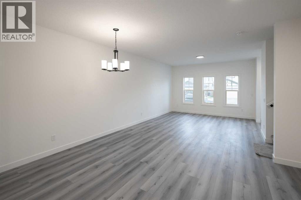 55 Baysprings Terrace Sw, Airdrie, Alberta  T4B 4A7 - Photo 3 - A2266129