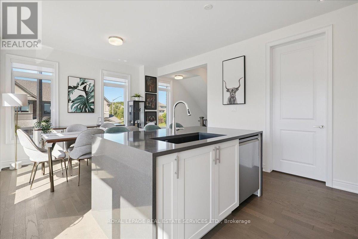 2180 Postmaster Drive, Oakville, Ontario L6M 5T1 - Photo 6 - W12437859