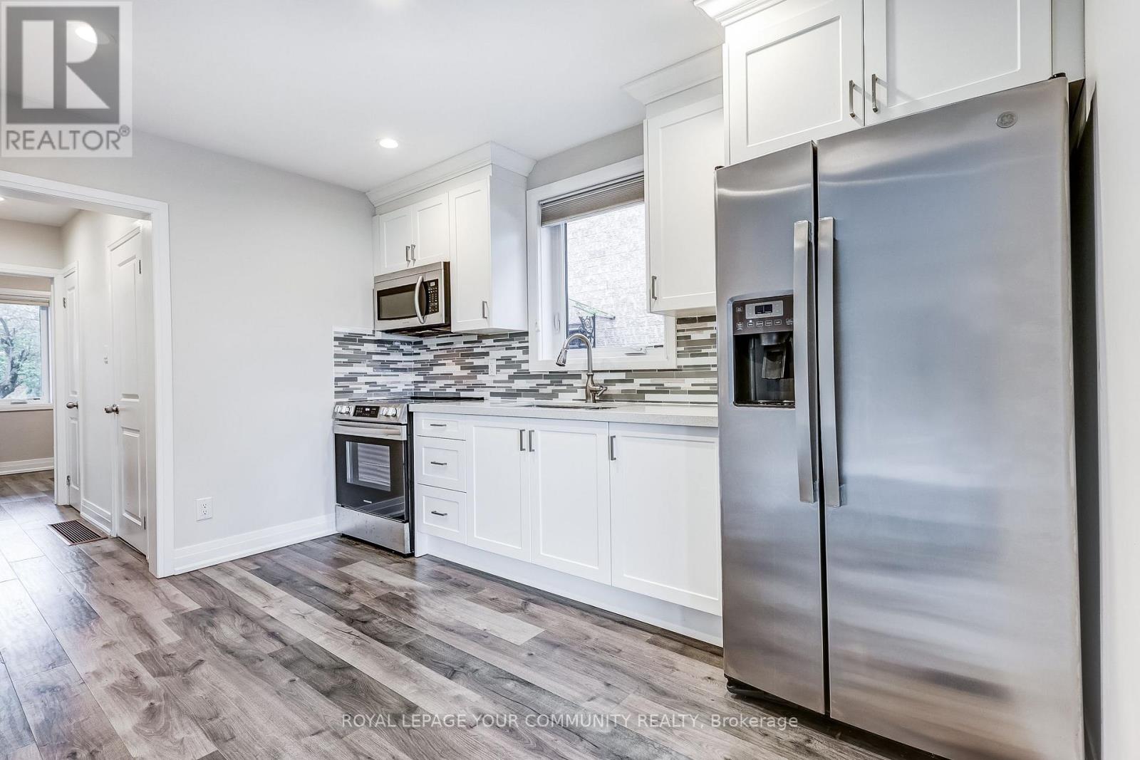 108 Ennerdale Road, Toronto, Ontario  M6E 4C6 - Photo 9 - W12550148