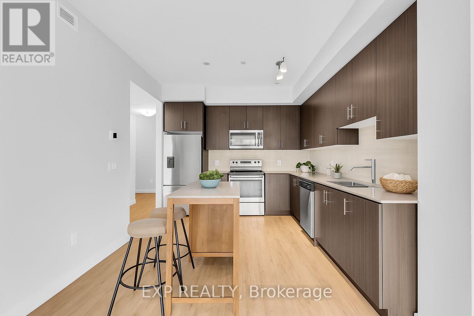 302 - 340 Plains Road E, Burlington, Ontario  L7T 0C2 - Photo 5 - W12550196