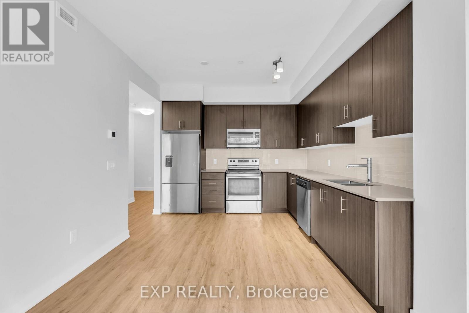 302 - 340 Plains Road E, Burlington, Ontario  L7T 0C2 - Photo 6 - W12550196