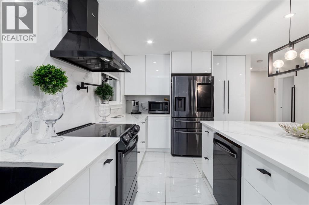 5 Sydney Drive Sw, Calgary, Alberta  T2W 0S7 - Photo 9 - A2269400