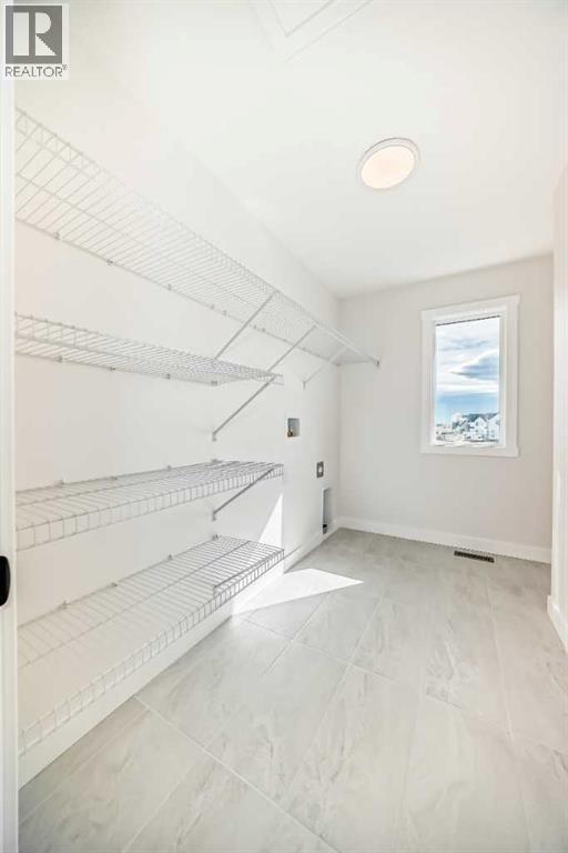 211 Perch Bend, Rural Rocky View County, Alberta  T3Z 0J9 - Photo 28 - A2250129