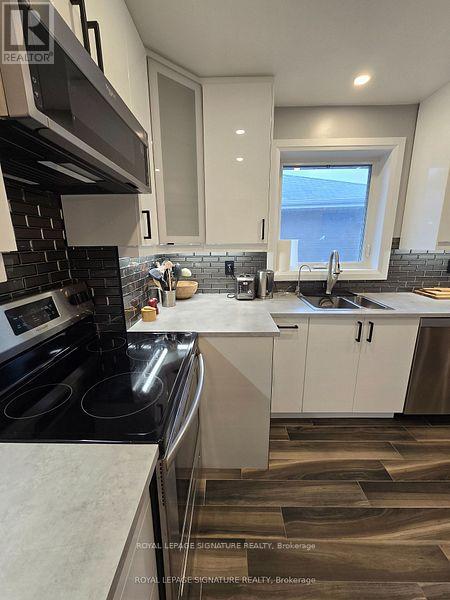 1228 Canvey Crescent, Mississauga, Ontario  L5J 1S1 - Photo 9 - W12550520