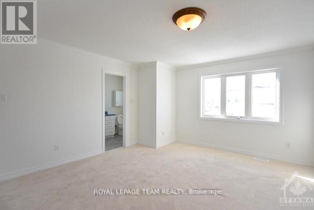 293 Forestbrook Street, Ottawa, Ontario  K2K 0B9 - Photo 4 - X12550640
