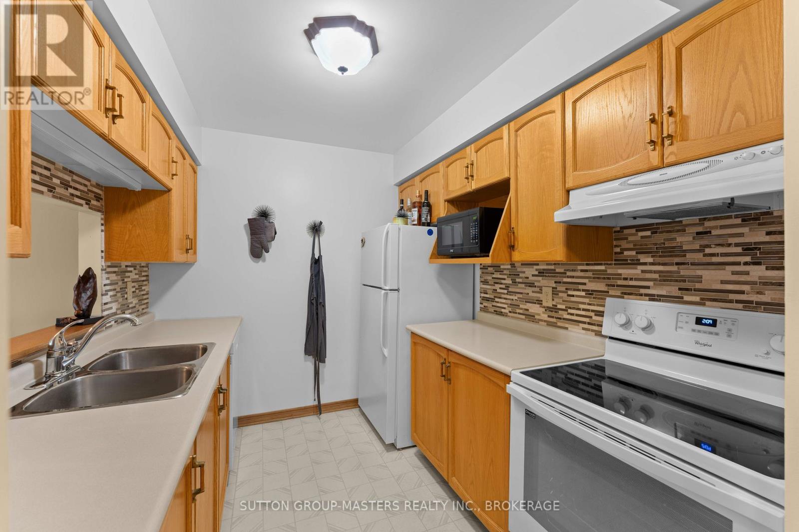 311 - 675 Davis Drive, Kingston, Ontario K7M 8L5 - Photo 8 - X12550786