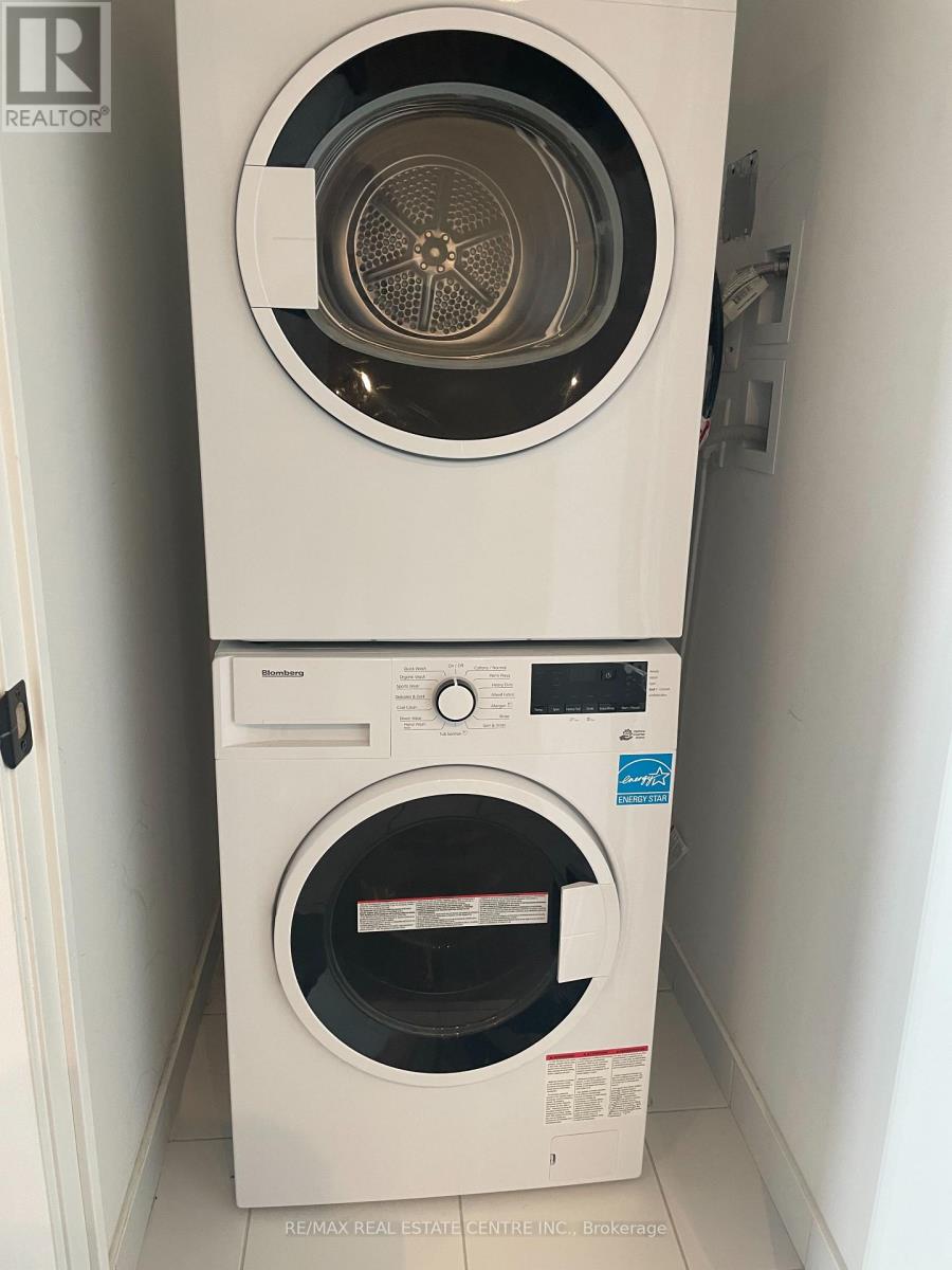 1112 - 2489 Taunton Road, Oakville, Ontario  L6H 3R9 - Photo 2 - W12550582