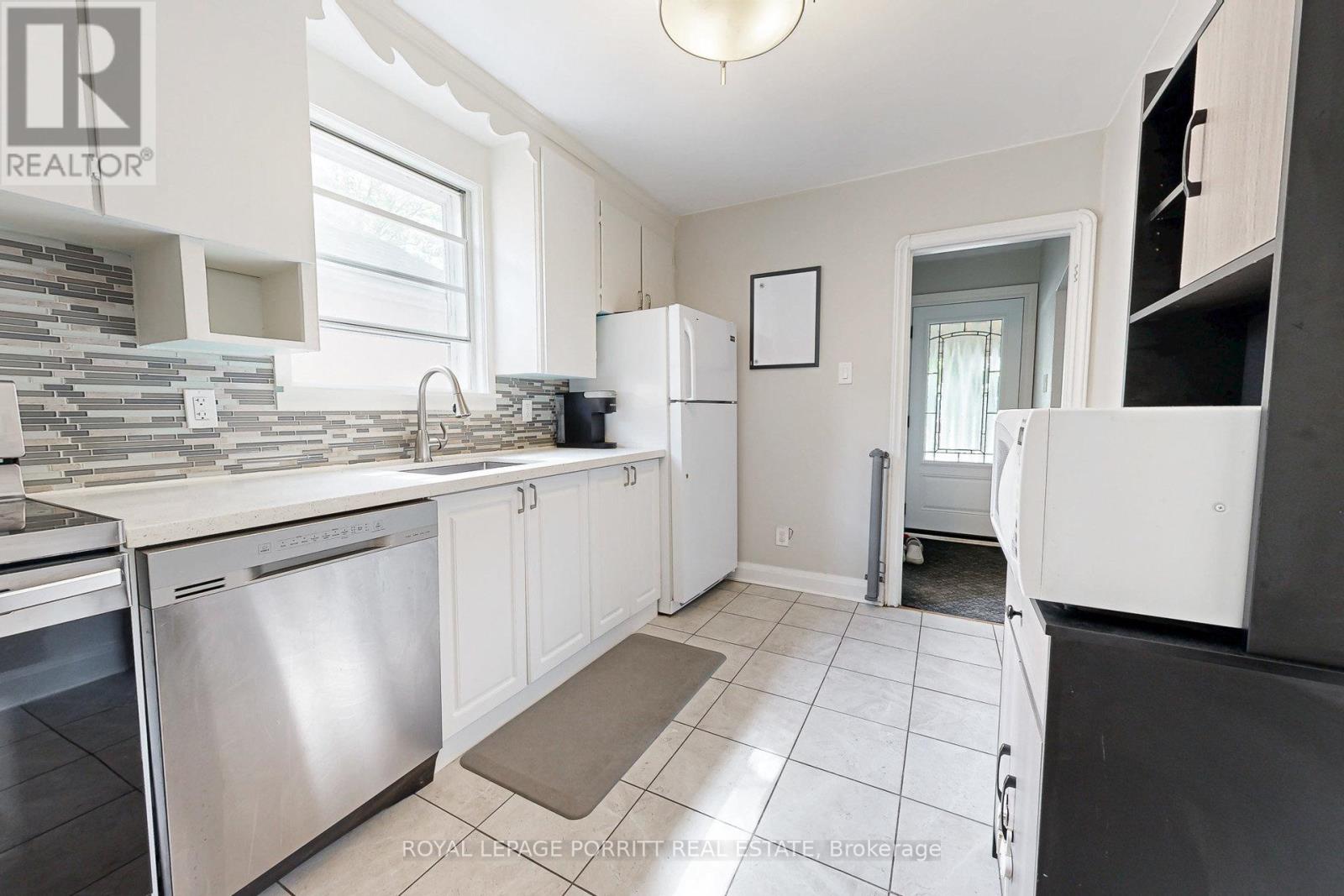 217 Alderbrae Avenue, Toronto, Ontario  M8W 4K4 - Photo 3 - W12550714