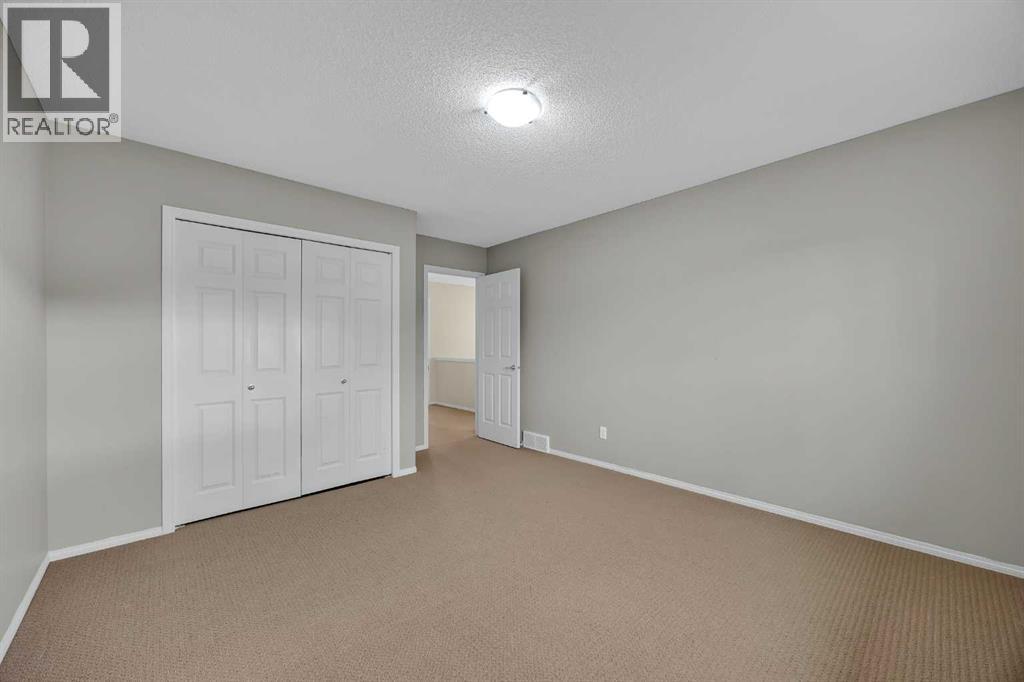 109 Bridlerange Place Sw, Calgary, Alberta  T2Y 0K8 - Photo 35 - A2270116
