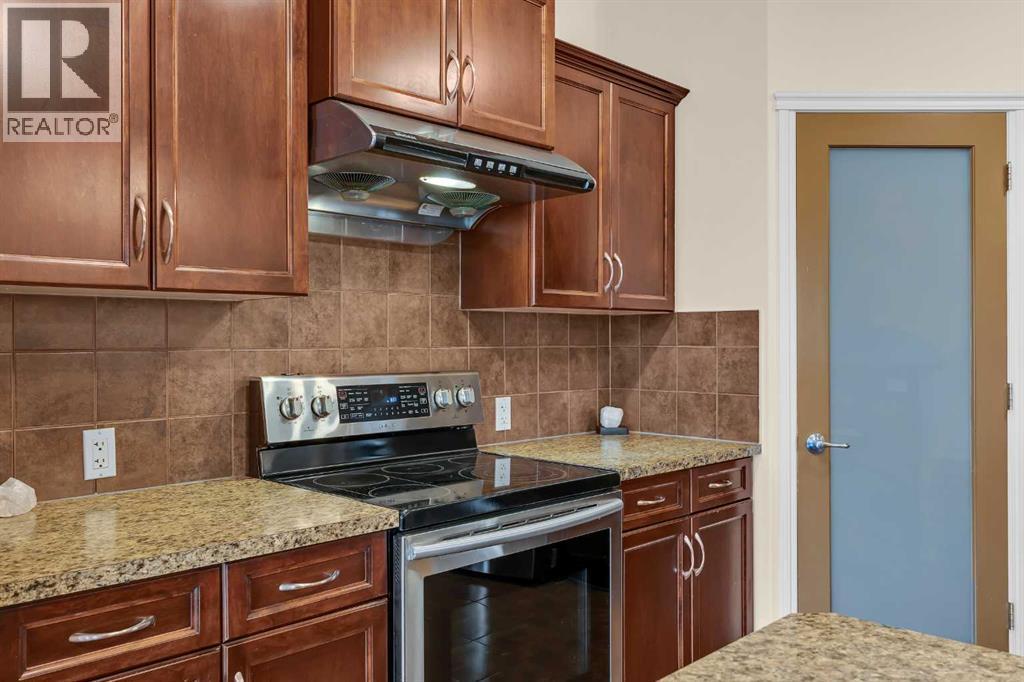 109 Bridlerange Place Sw, Calgary, Alberta  T2Y 0K8 - Photo 7 - A2270116