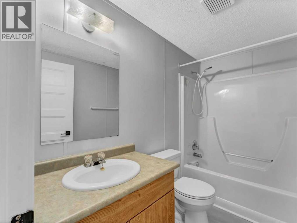 57 Maple Drive W, Brooks, Alberta  T1R 1J2 - Photo 14 - A2270983