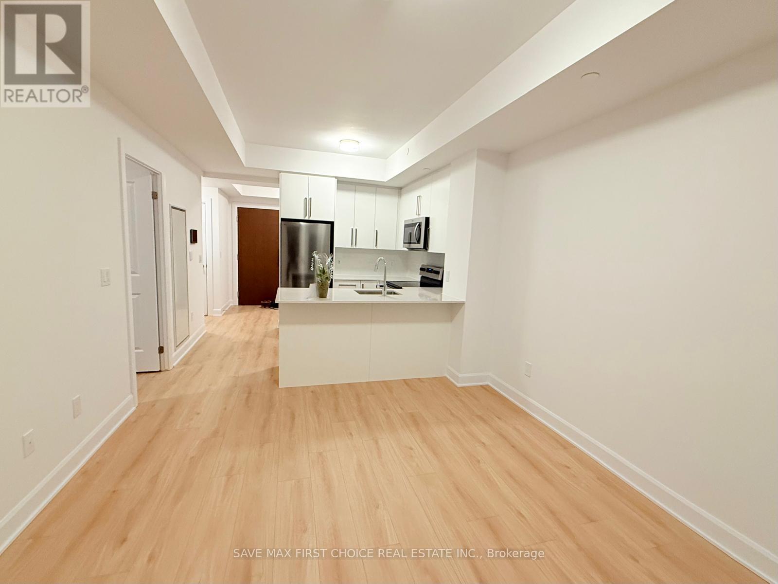 719 - 3240 William Coltson Avenue, Oakville, Ontario  L6H 8C8 - Photo 3 - W12550990