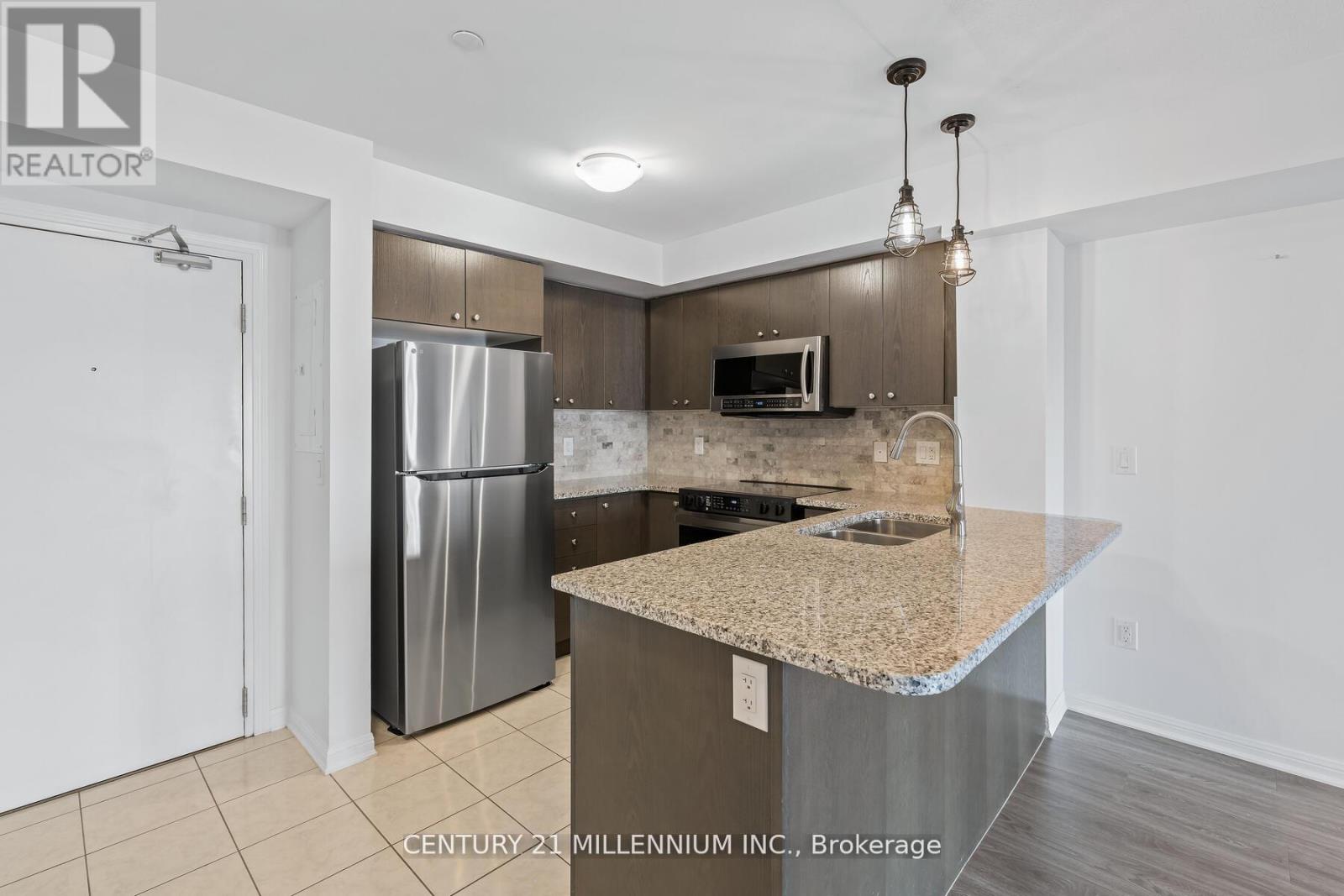 111 - 1045 Nadalin Heights, Milton, Ontario L9T 8R5 - Photo 4 - W12551016