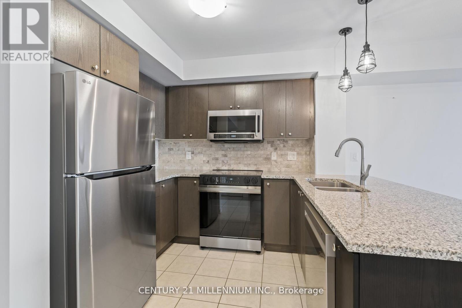 111 - 1045 Nadalin Heights, Milton, Ontario L9T 8R5 - Photo 3 - W12551016