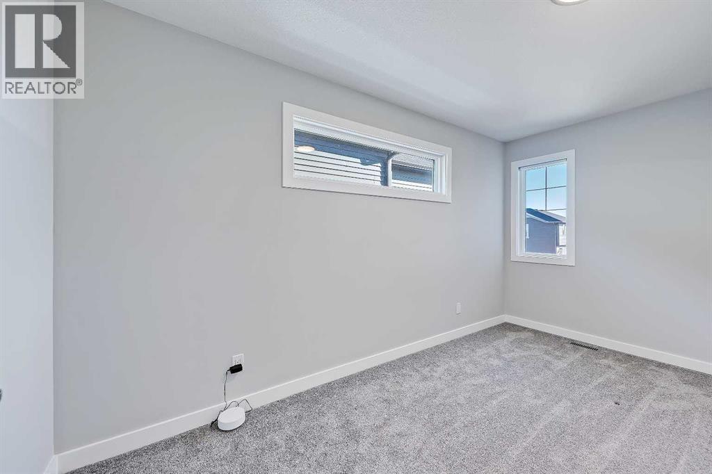 78 Larkspur Bend, Okotoks, Alberta  T1S 4E6 - Photo 23 - A2267425