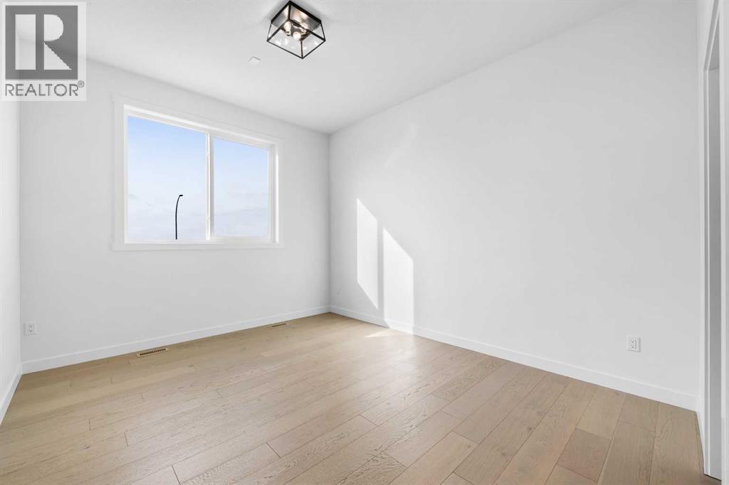 27 Wolf Crescent, Okotoks, Alberta  T1S 5V1 - Photo 7 - A2266958