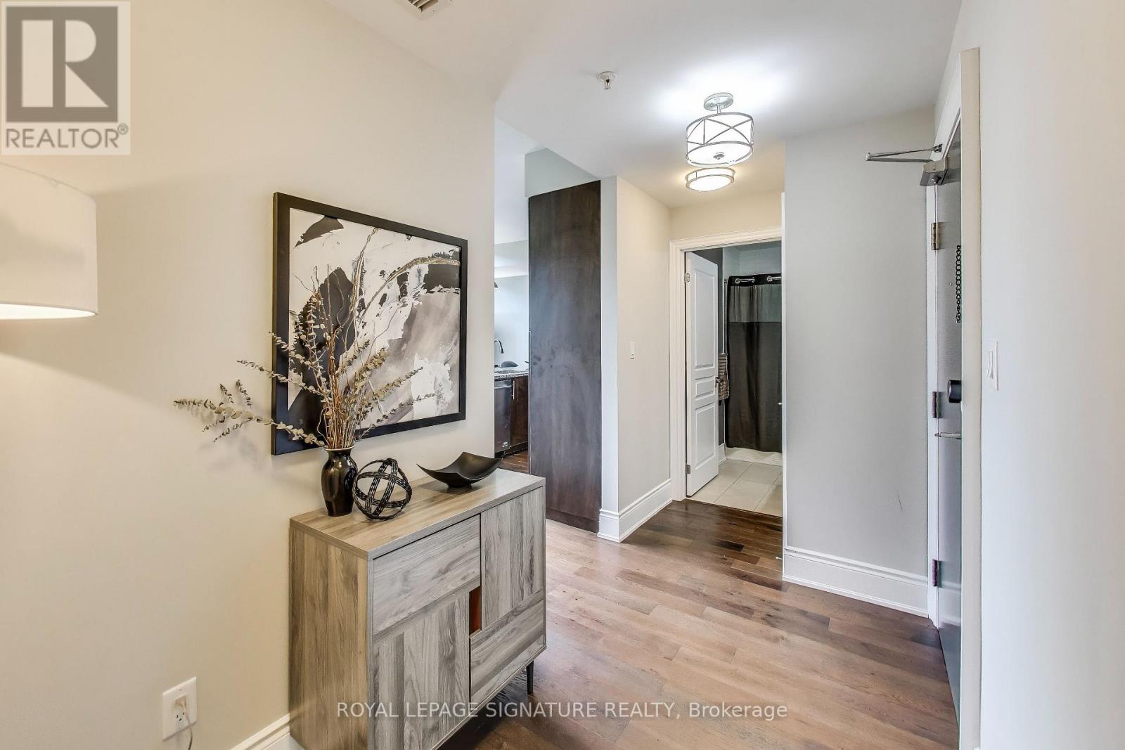 405 - 3170 Erin Mills Parkway, Mississauga, Ontario  L5L 0B6 - Photo 2 - W12551676