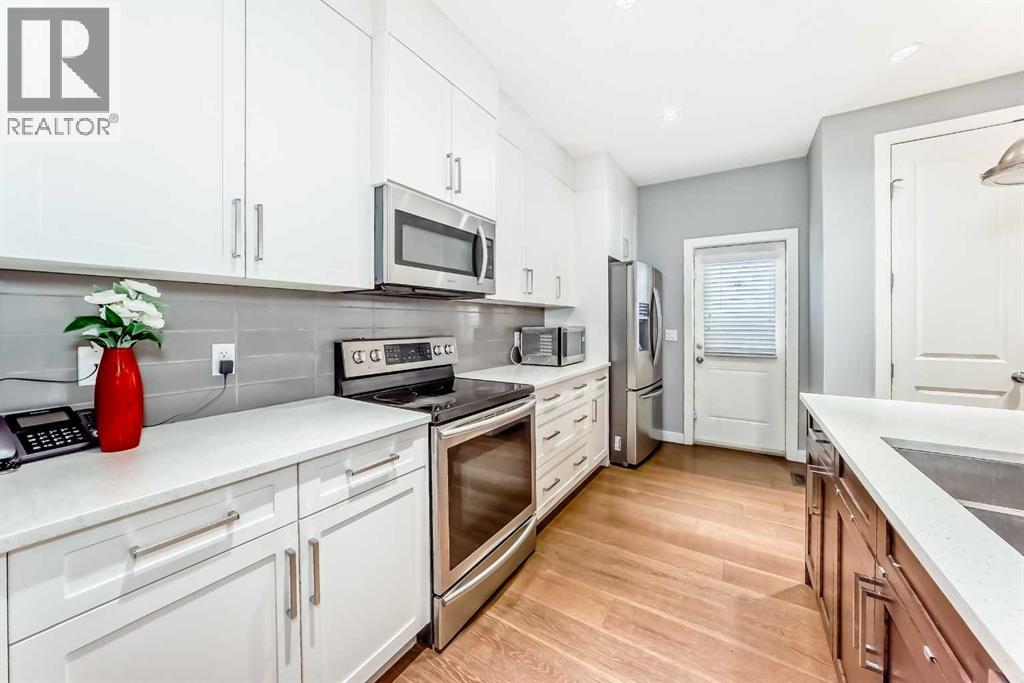 512 Baysprings Lane Sw, Airdrie, Alberta  T4B 3X8 - Photo 9 - A2270941