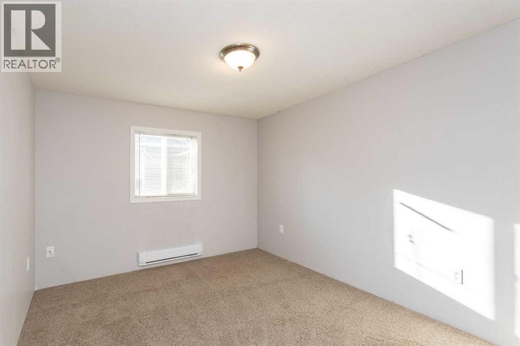 7 Parkland Acres, Lacombe, Alberta  T4L 1T2 - Photo 4 - A2269385