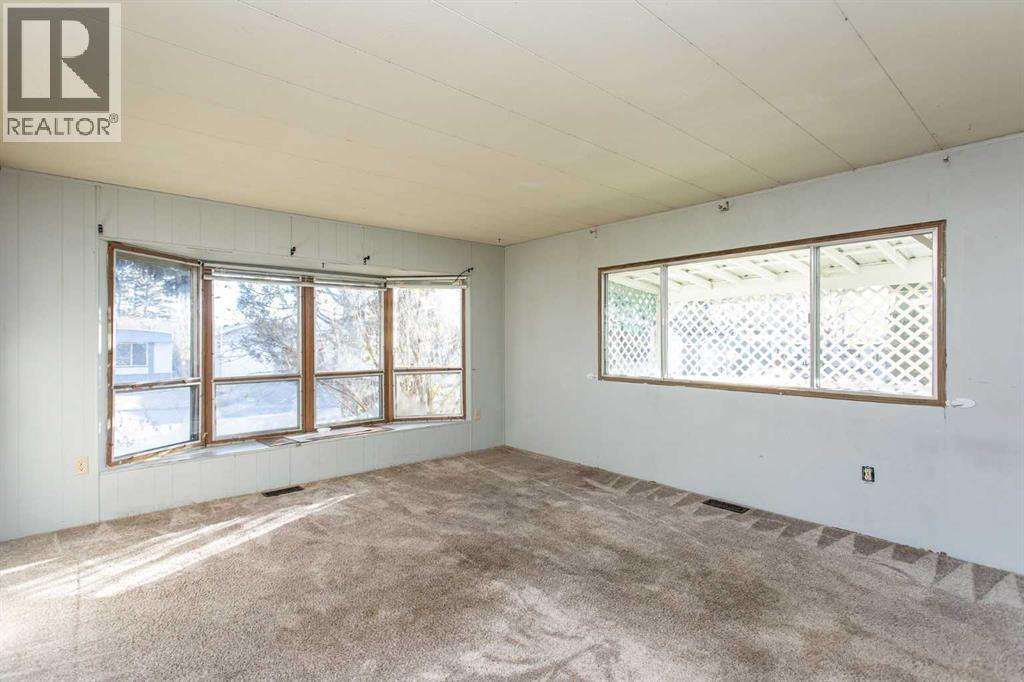 7 Parkland Acres, Lacombe, Alberta  T4L 1T2 - Photo 8 - A2269385