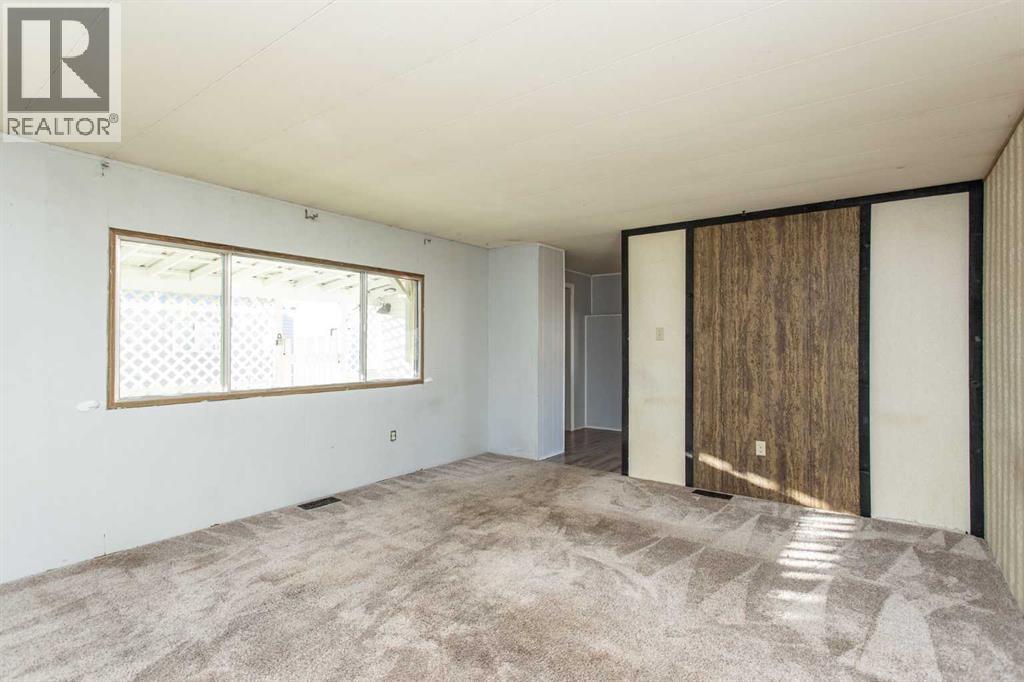 7 Parkland Acres, Lacombe, Alberta  T4L 1T2 - Photo 9 - A2269385