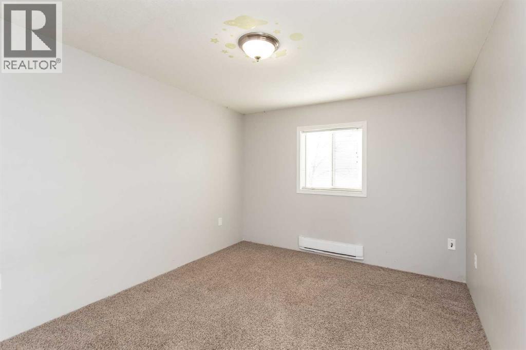 7 Parkland Acres, Lacombe, Alberta  T4L 1T2 - Photo 5 - A2269385