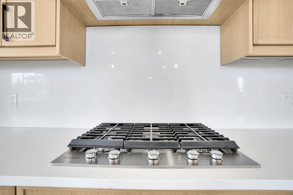 75 Sunvalley Way, Cochrane, Alberta  T4C 0X8 - Photo 5 - A2263493