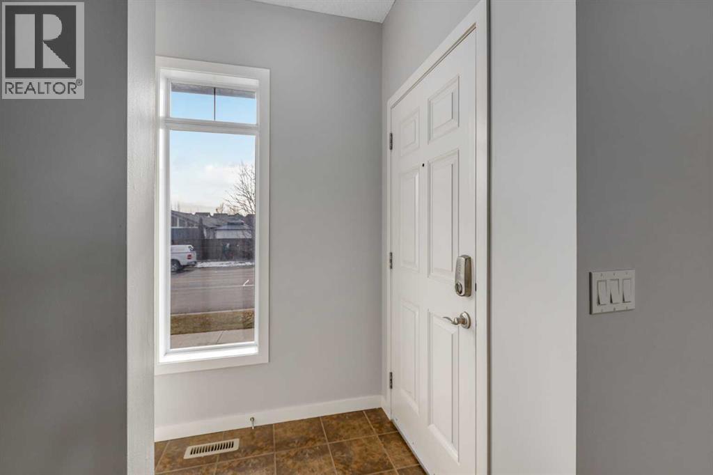 84 Fireside Way, Cochrane, Alberta  T4C 0R1 - Photo 3 - A2265406