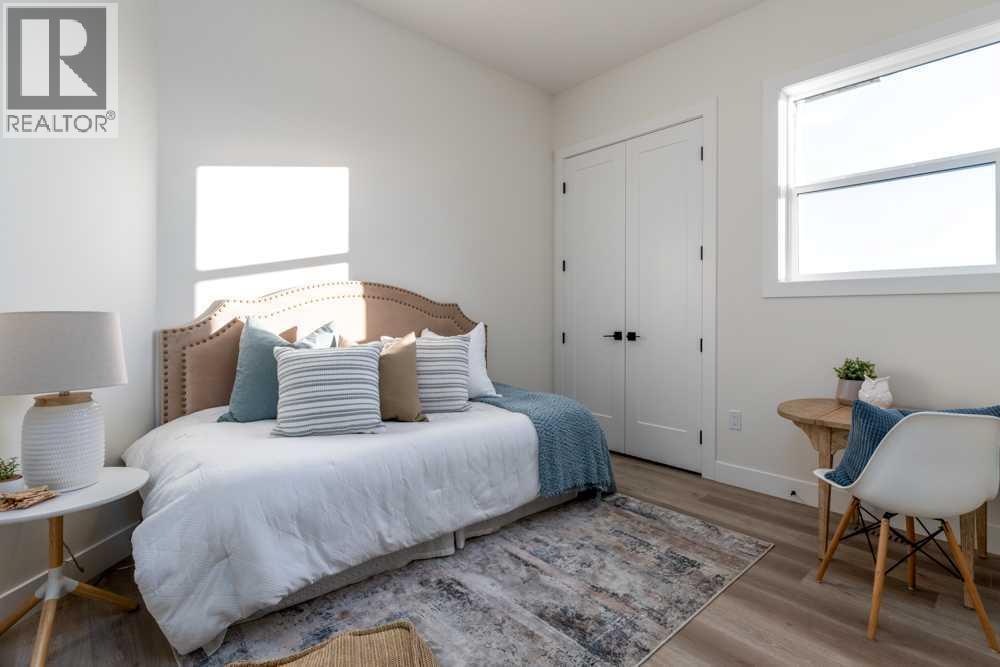 716 Mandalay Avenue, Carstairs, Alberta  T0M 0N0 - Photo 9 - A2254899